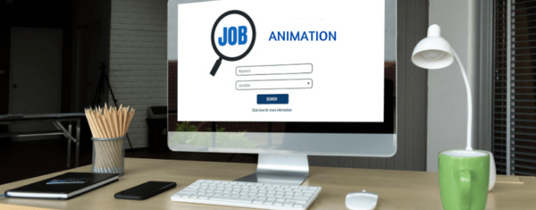Bureau avec un ordinateur affichant 'Animation', représentant les recherches d'emploi dans l'animation